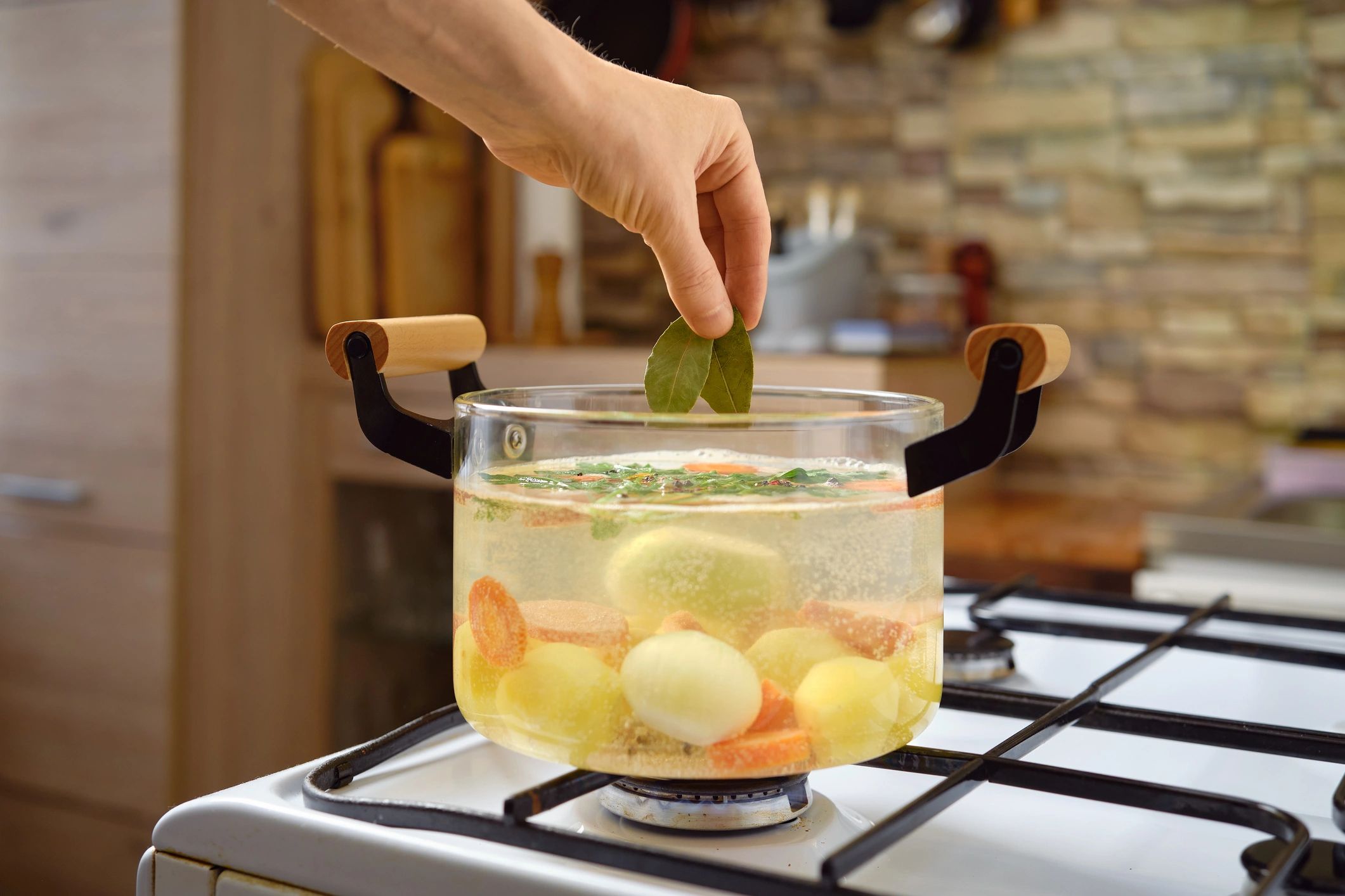 natural simmer pot on stove with citrus and spices