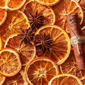 dried oranges cinnamon sticks cloves rustic bag